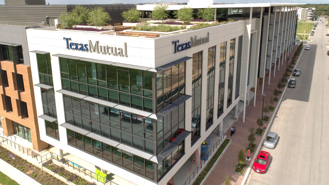 Image of Texas Mutual Insurance company building. 